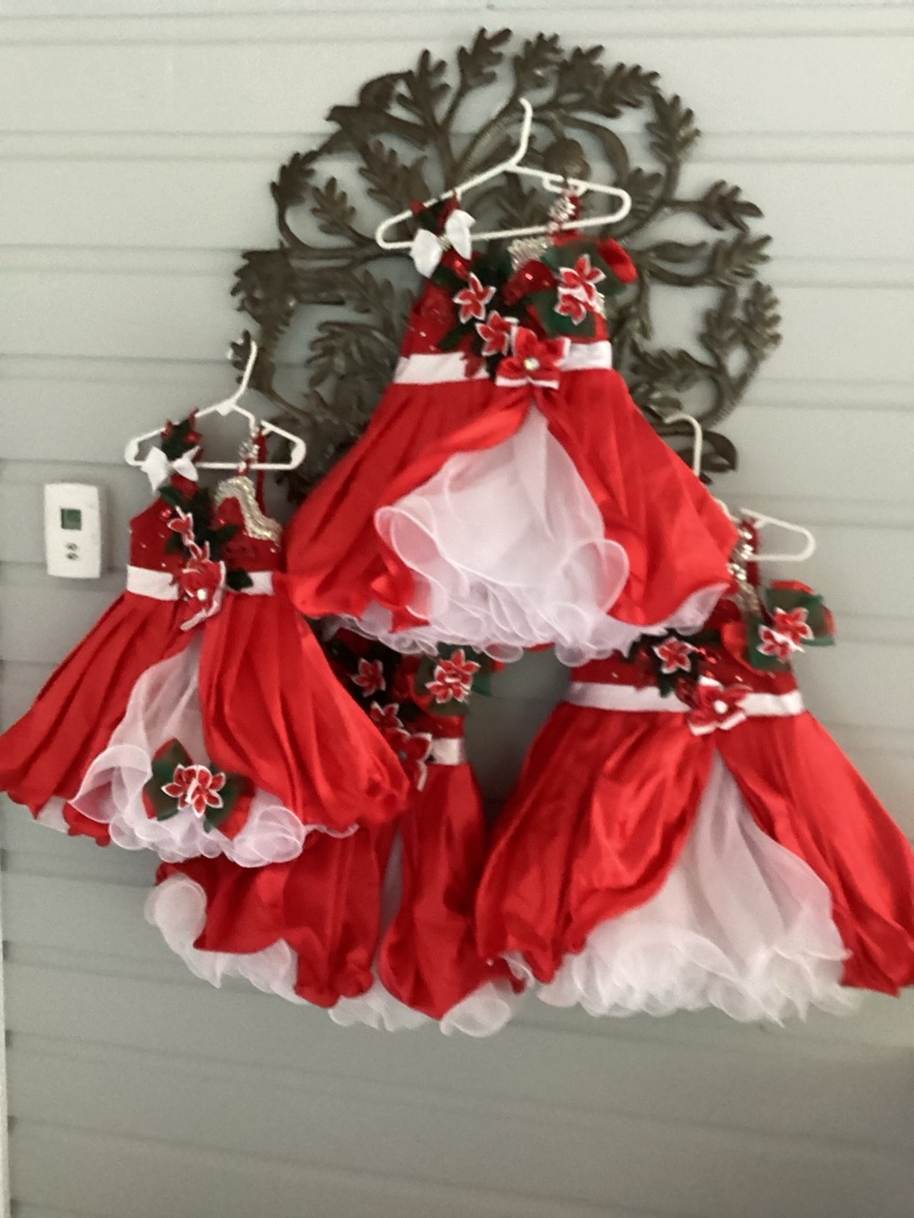 Four elegant dance pageant costumes